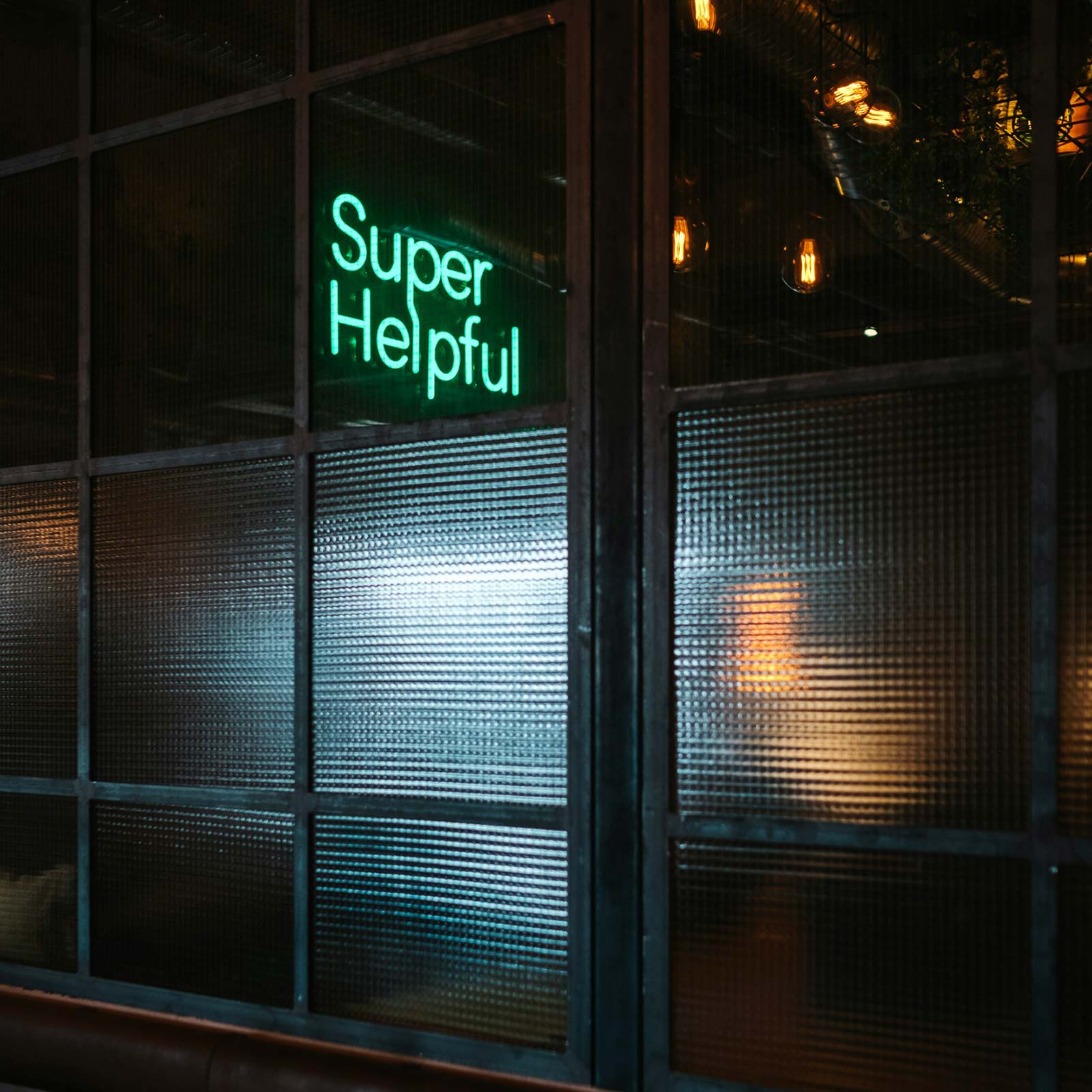 Shopify Forms super helpful neon sign in green