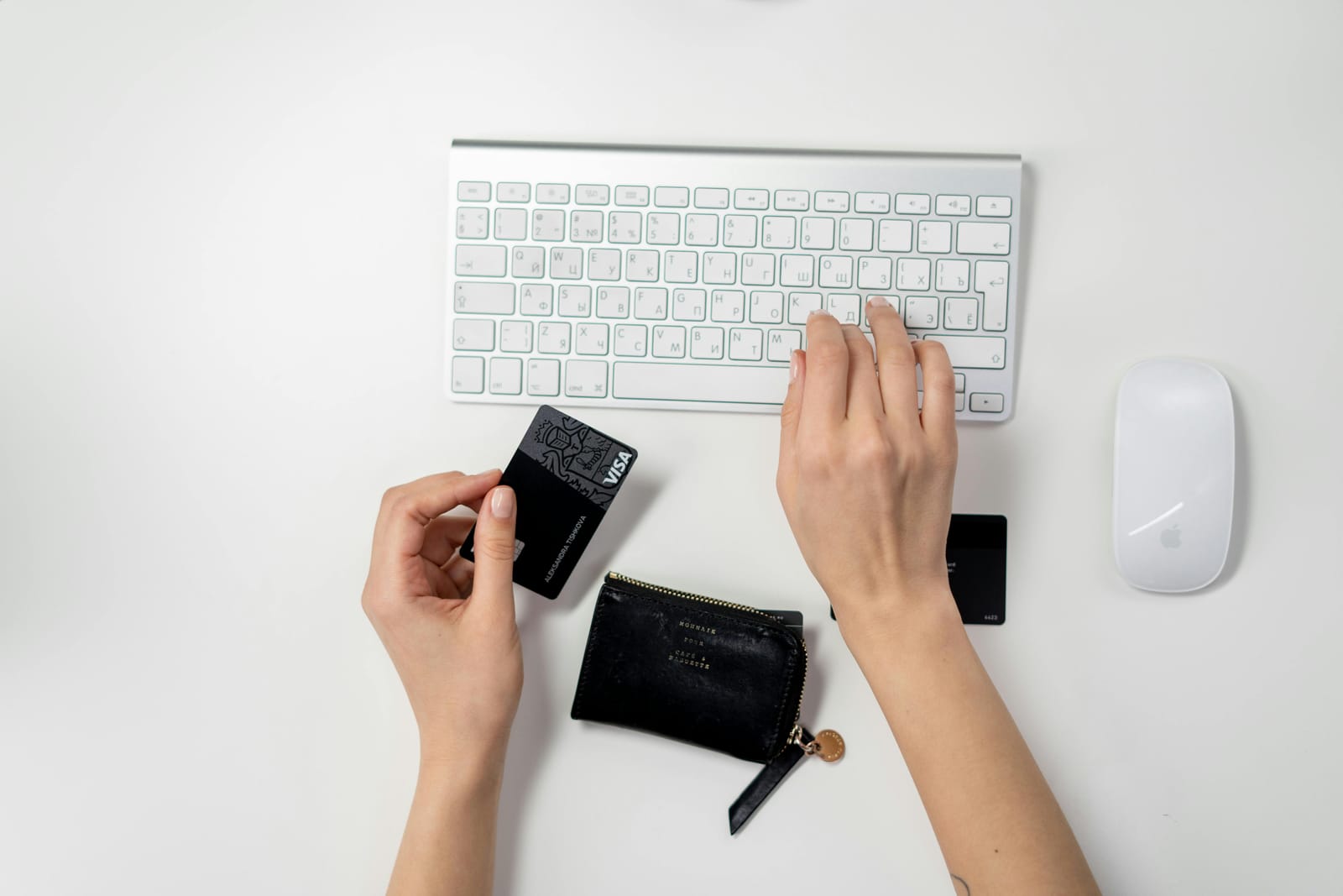 hands with credit card online shopping keyboard 